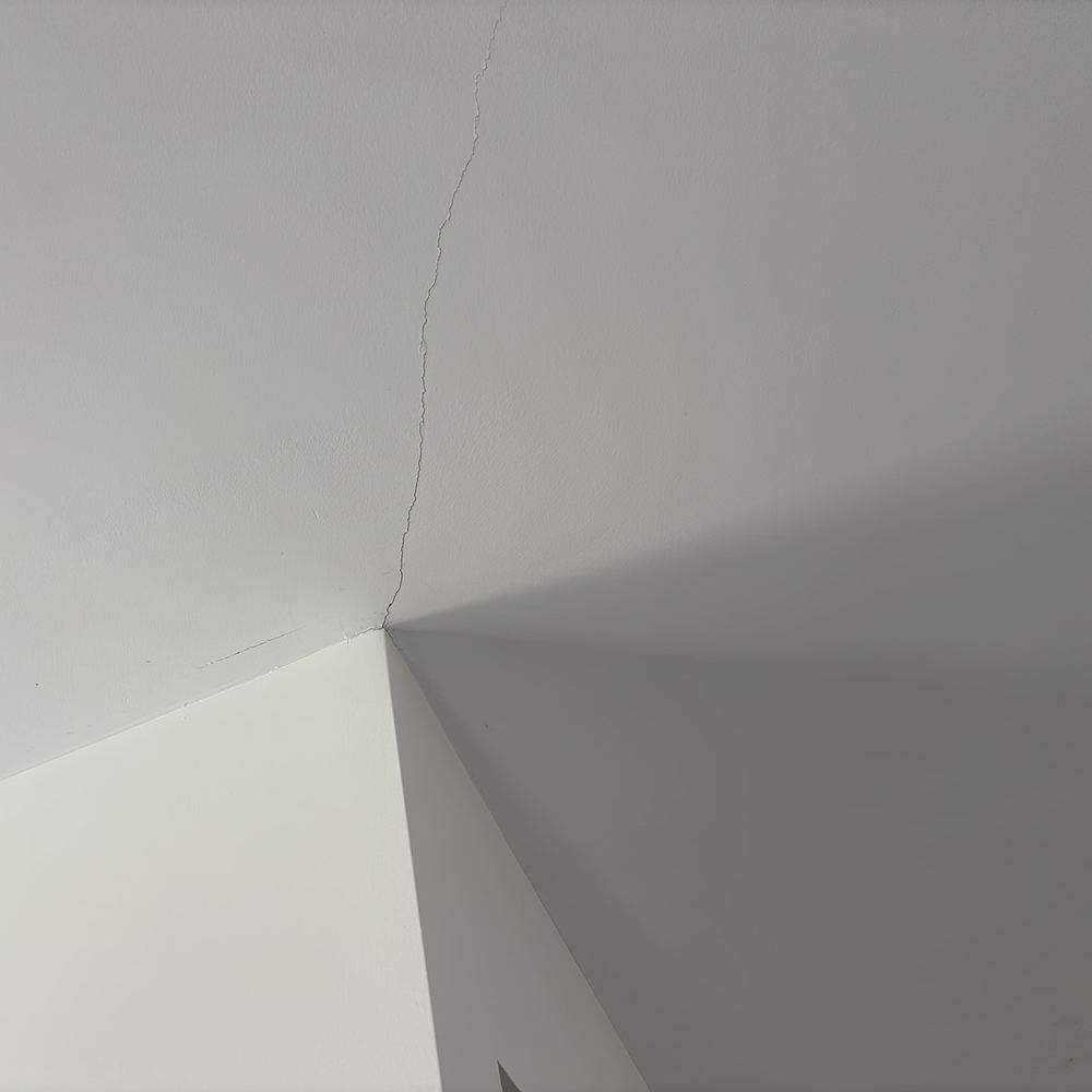 Hairline cracking logged for monitoring in a recently built home, found during a defect investigation inspection in Derrimut