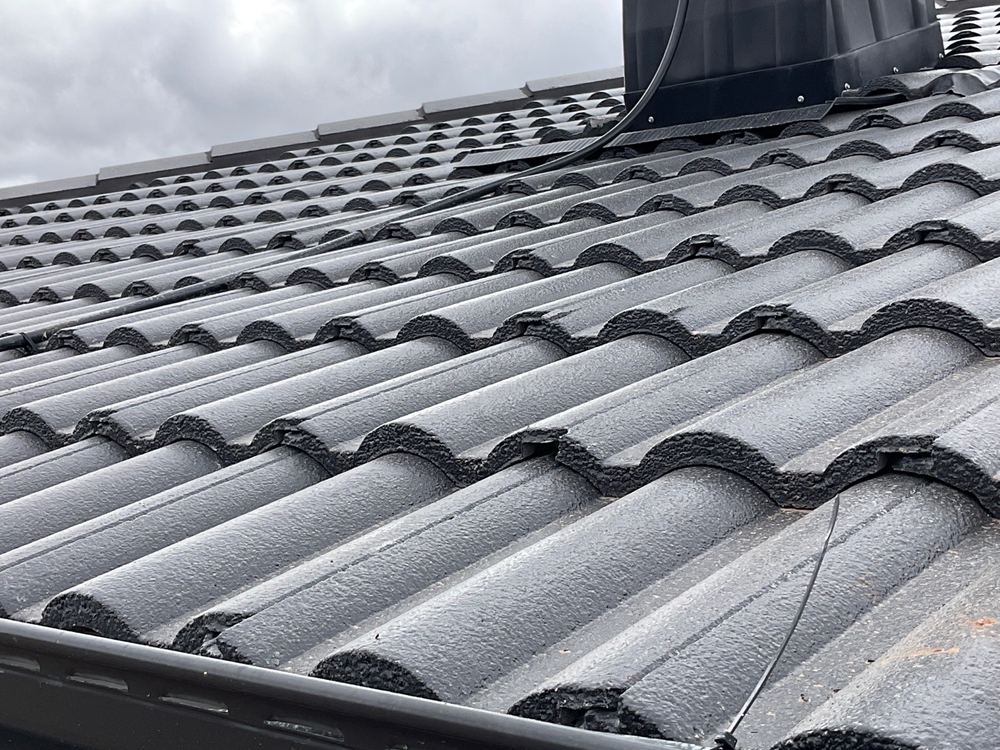 Broken tile underlaps that stop the roof staying watertight in heavy rain, found during a lock-up inspection in Truganina