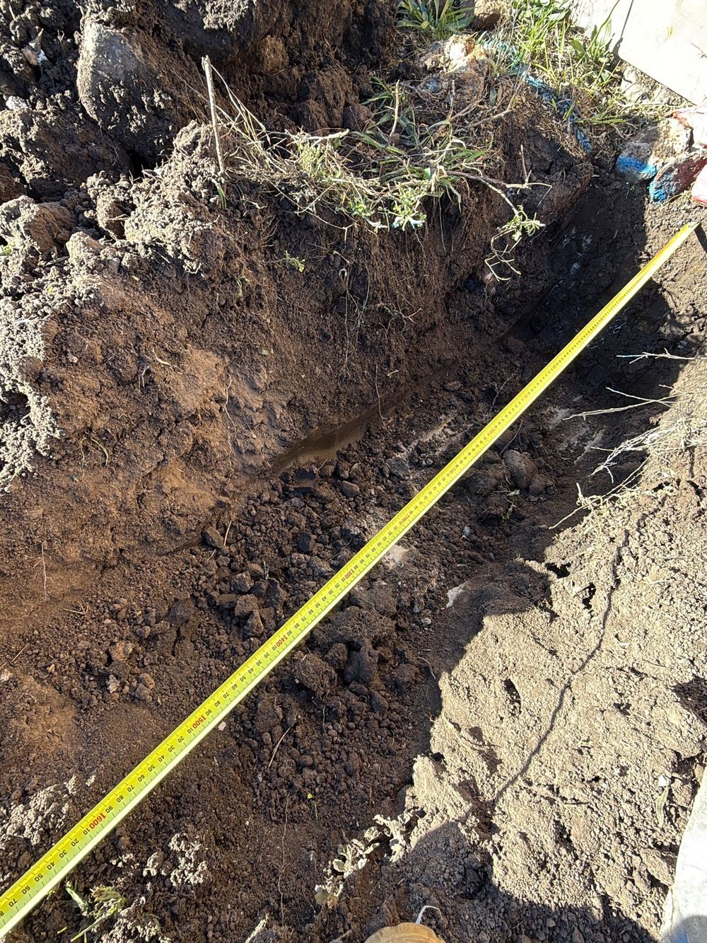 Pier hole still holding loose soil that has to come out down to firm ground, found during a bored pier inspection in Donnybrook