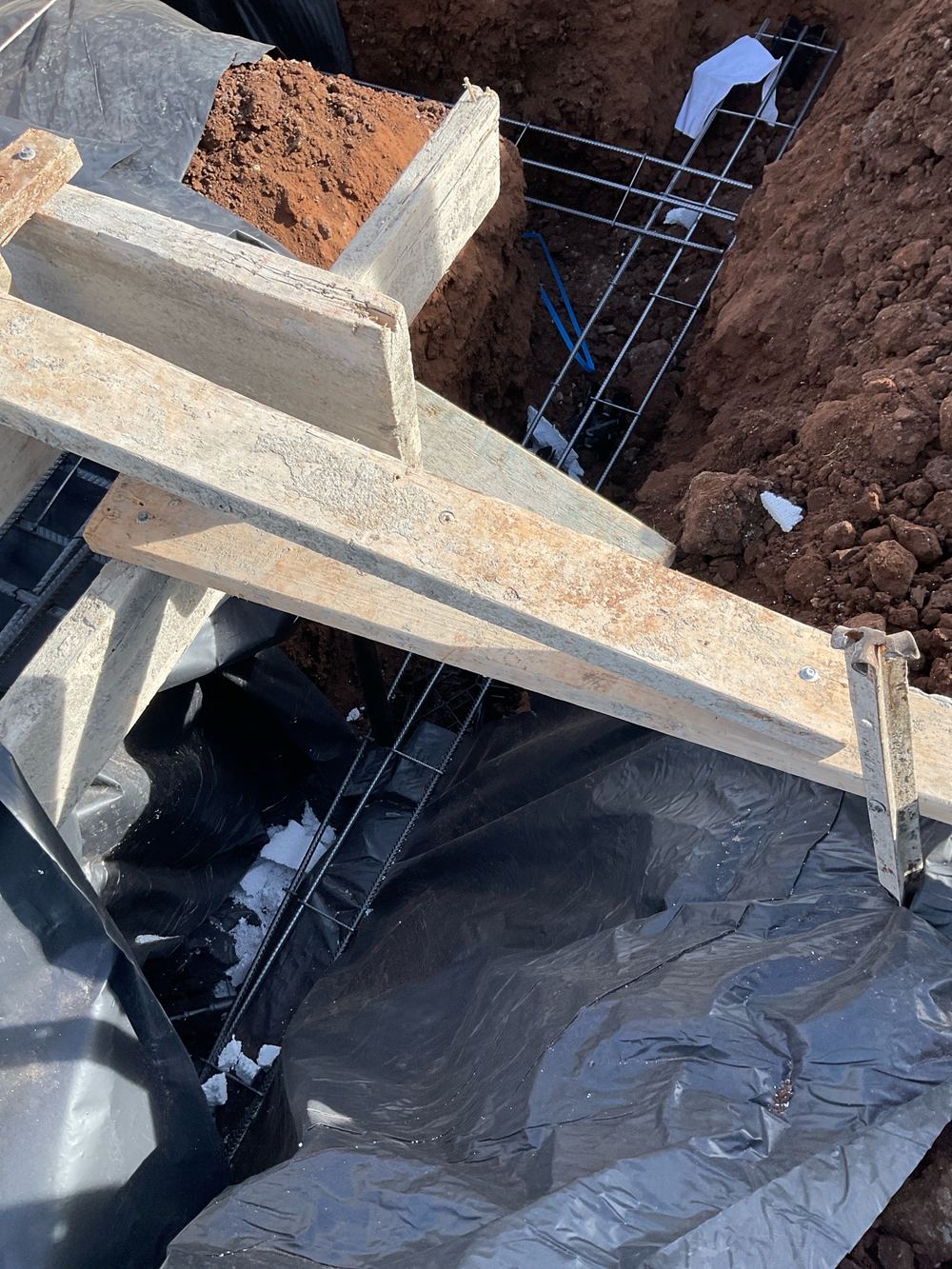 Slab mesh cut through in one section and needing extra steel to bridge it, Truganina