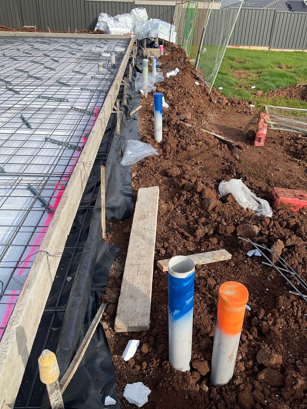 Sewer and stormwater pipe ends left open where debris can fall in, found during a construction stage inspection in Truganina